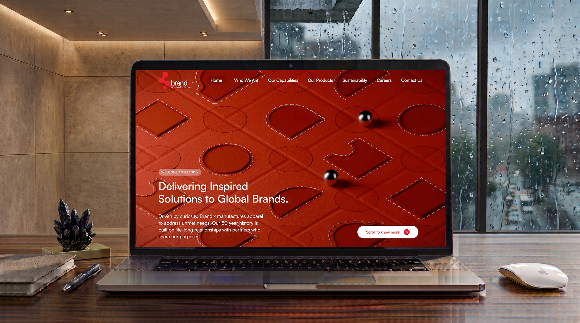 Brandix website homepage shown on a laptop screen on a desk.