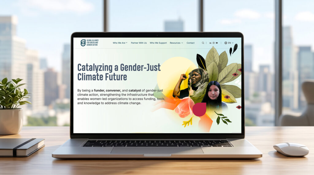 Global Alliance for Green and Gender Action website homepage shown on a laptop screen on a desk.