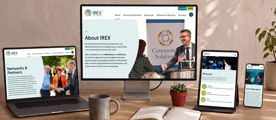 IREX website interface displayed across desktop, laptop, tablet, and smartphone screens.